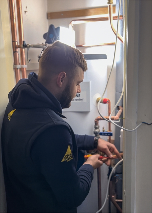 Gas Safe Installer rewiring boiler system