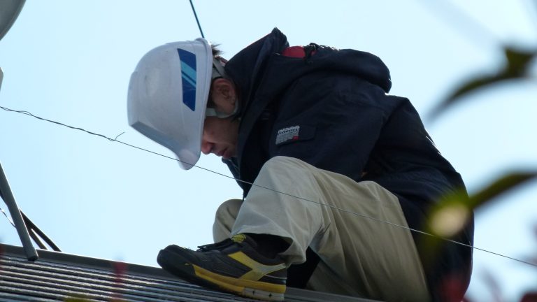Solar panel installation in progress (stock photo)